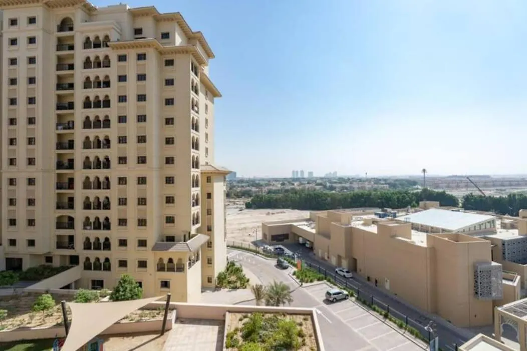 Stylish 1-Bedroom Retreat With Pool In Vibrant Jumeirah Golf Estates Dubai Apartment