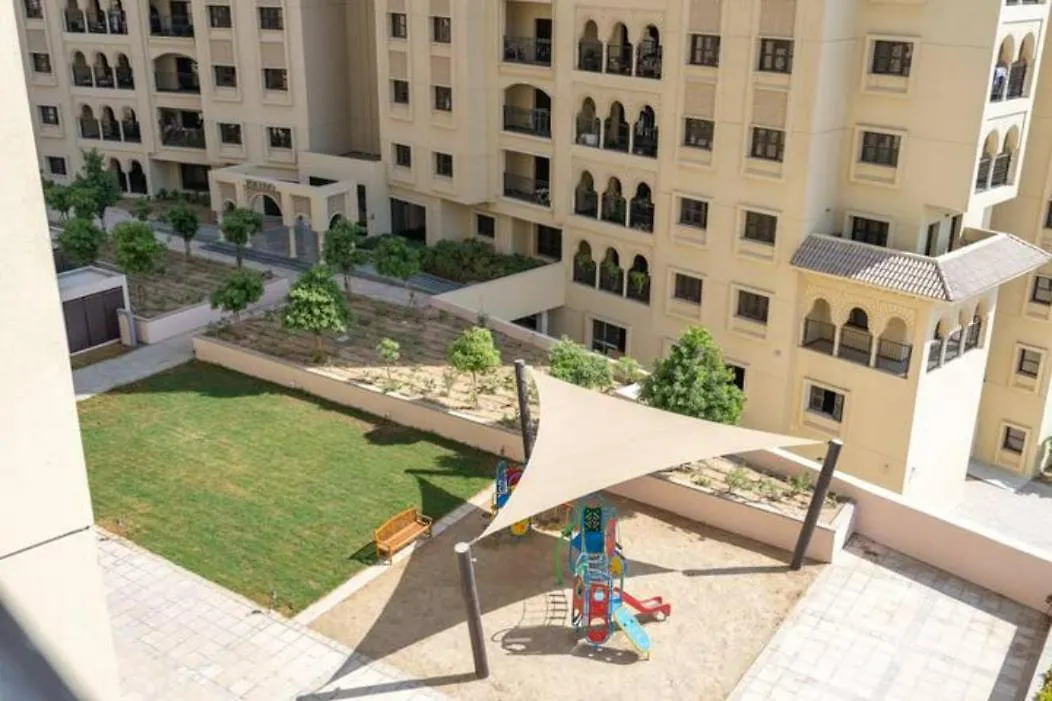 Stylish 1-Bedroom Retreat With Pool In Vibrant Jumeirah Golf Estates Dubai Apartment